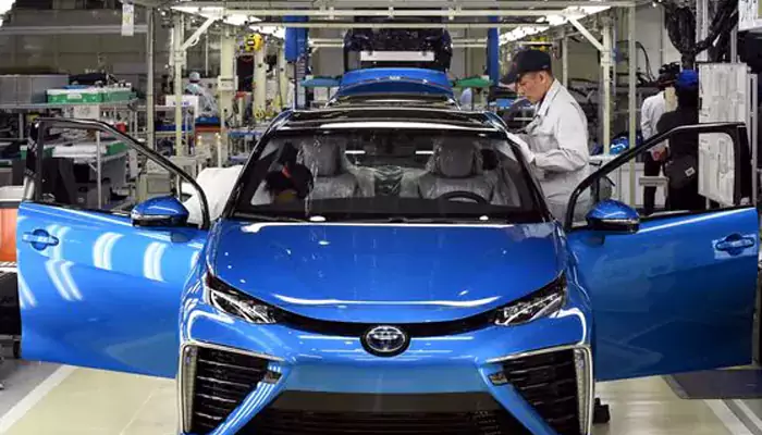 Toyota, world's largest car maker, sees sales drop in world's largest car market
